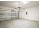 Spacious two-car garage with concrete flooring and white brick walls at 4106 Nw 44 Cir, Ocala, FL 34482