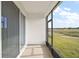 Relaxing screened porch with views of the open backyard with no rear neighbors at 4106 Nw 44 Cir, Ocala, FL 34482