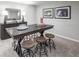 Finished basement area with a bar, seating, decorative items, and entertainment features at 480 Crossings Ave, St Cloud, FL 34771