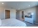 The bedroom includes neutral walls, carpet flooring, recessed lights, and a dresser with decoratives at 554 Highfalls Ave, Debary, FL 32713