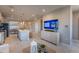 Open-concept living space with a modern kitchen, dining area, and a spacious living room at 554 Highfalls Ave, Debary, FL 32713