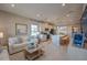 Cozy living room with a modern kitchen, comfortable seating, and a welcoming atmosphere at 554 Highfalls Ave, Debary, FL 32713