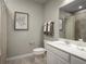 Clean bathroom with a single vanity, neutral tones, and a shower-tub combination at 1548 Covey Rise Ter, Winter Haven, FL 33884