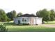 Charming single-story home featuring a well-manicured lawn and a light-colored facade at 3730 Kings Canyon Dr, Apopka, FL 32712