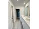 Modern bathroom with double vanity, clean lines, and contemporary finishes for a spa-like feel at 5232 Luisa Ct, St Cloud, FL 34771
