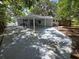 Spacious backyard with covered parking and concrete patio at 2827 Se 2Nd St, Ocala, FL 34471