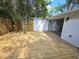 Outdoor deck area featuring a natural wood finish and partial shade at 2827 Se 2Nd St, Ocala, FL 34471