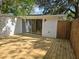 Outdoor deck area with light wood finish; home exterior visible at 2827 Se 2Nd St, Ocala, FL 34471