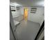 Basement space with finished floors and built-in shelving and cabinets at 2827 Se 2Nd St, Ocala, FL 34471