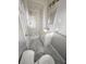Bathroom with walk-in shower, marble accents, updated vanity and fixtures at 2827 Se 2Nd St, Ocala, FL 34471