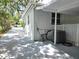 View of long driveway and carport area, showing the home's exterior and landscaping at 2827 Se 2Nd St, Ocala, FL 34471