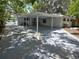 Large carport providing ample covered parking space and convenient access to the home at 2827 Se 2Nd St, Ocala, FL 34471