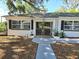 Charming entrance with updated landscape and exterior lighting at 2827 Se 2Nd St, Ocala, FL 34471
