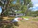 Charming single-story home with mature trees, landscaped yard at 2827 Se 2Nd St, Ocala, FL 34471