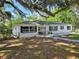 Charming single-story home with mature trees, landscaped yard at 2827 Se 2Nd St, Ocala, FL 34471