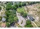 Aerial view of community with dedicated parking and manicured landscaping leading to amenity center at 8596 Sw 108Th Place Rd, Ocala, FL 34481