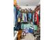 Walk-in closet with storage solutions for clothing, shoes and bags at 8596 Sw 108Th Place Rd, Ocala, FL 34481