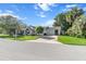 Inviting home exterior with a well-manicured lawn and charming curb appeal at 8596 Sw 108Th Place Rd, Ocala, FL 34481
