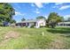 Charming home exterior with well-kept lawn and landscaping at 8596 Sw 108Th Place Rd, Ocala, FL 34481