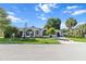 Beautiful single-story home with lush landscaping and an extended driveway at 8596 Sw 108Th Place Rd, Ocala, FL 34481