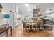Open living space featuring a kitchen, dining area and a piano room, perfect for entertaining Gathering and friends at 8596 Sw 108Th Place Rd, Ocala, FL 34481