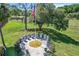 Beautiful aerial view of a local war memorial in a grassy area with large trees at 8596 Sw 108Th Place Rd, Ocala, FL 34481