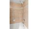 Clean shower with tiled walls and handheld shower head at 8596 Sw 108Th Place Rd, Ocala, FL 34481