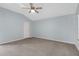 Vaulted ceiling bedroom with neutral carpet, a ceiling fan, and freshly painted walls at 1424 Figueroa St, The Villages, FL 32162