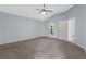 Vaulted ceiling bedroom with neutral carpet and freshly painted walls at 1424 Figueroa St, The Villages, FL 32162