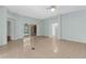 Large, airy living room with sliding glass doors to the outside at 1424 Figueroa St, The Villages, FL 32162
