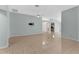 Spacious living room with tiled floors and open access to other rooms at 1424 Figueroa St, The Villages, FL 32162