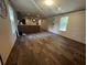 Spacious living room featuring wood-look flooring and natural light at 3346 Se 131St Pl, Belleview, FL 34420