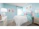 Bright, cheerful bedroom featuring a comfortable bed, colorful accents, and a calming ambiance at 454 Hammock Oaks Blvd, Lady Lake, FL 32159