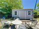 View of a shed and outdoor seating in the backyard at 801 Nw 16Th Ct, Ocala, FL 34475