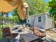 View of a shed and outdoor seating in the backyard at 801 Nw 16Th Ct, Ocala, FL 34475