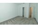 Bedroom features white walls, neutral carpet and a closet at 7433 Stone Creek Trl, Kissimmee, FL 34747