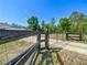 Gated perimeter encloses a vast property, promoting safety and providing an exclusive appeal at 12396 Sw 64Th Street Rd, Ocala, FL 34481