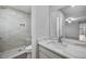 Modern bathroom with a new marble tiled shower and vanity, providing a luxurious spa-like experience at 4856 Colonnades W Cir, Lakeland, FL 33811