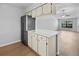 Modern kitchen with a breakfast bar open to the living area, perfect for casual dining and socializing at 4856 Colonnades W Cir, Lakeland, FL 33811