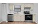 Modern kitchen featuring neutral cabinets, stainless steel appliances, and durable countertop material at 4856 Colonnades W Cir, Lakeland, FL 33811
