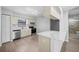 Bright kitchen with stainless steel appliances and breakfast bar, convenient for meal preparation and serving at 4856 Colonnades W Cir, Lakeland, FL 33811