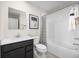 This bathroom has tile floors, a shower and tub combination and modern sink at 1196 Port Blue Way, Lady Lake, FL 32159