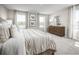 Beautiful main bedroom boasts plush carpet and natural light throughout at 1196 Port Blue Way, Lady Lake, FL 32159