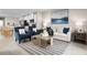 Open-concept living room with lake views and stylish furniture and decor at 1252 Turtle Island Rd, Lady Lake, FL 32159