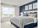 Comfortable main bedroom featuring serene decor, natural light, and a scenic outdoor view at 1252 Turtle Island Rd, Lady Lake, FL 32159