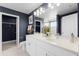 Elegant bathroom with double sinks, sleek fixtures, and a contemporary design at 3311 Grande Heron Dr, St Cloud, FL 34773