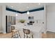 Modern kitchen with stainless steel appliances, white cabinets and a large island at 3311 Grande Heron Dr, St Cloud, FL 34773