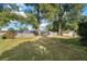 Expansive backyard enclosed by a wooden fence, providing privacy and a secure space for outdoor enjoyment at 4851 Ne 7Th St, Ocala, FL 34470