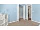 Bedroom closet showcasing shelving and ample space, perfect for organized storage at 4851 Ne 7Th St, Ocala, FL 34470