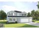 Two-story home features light-blue siding, gray shutters, three-car garage, and manicured landscaping at 11057 Nellie Crossing Cir, Clermont, FL 34711